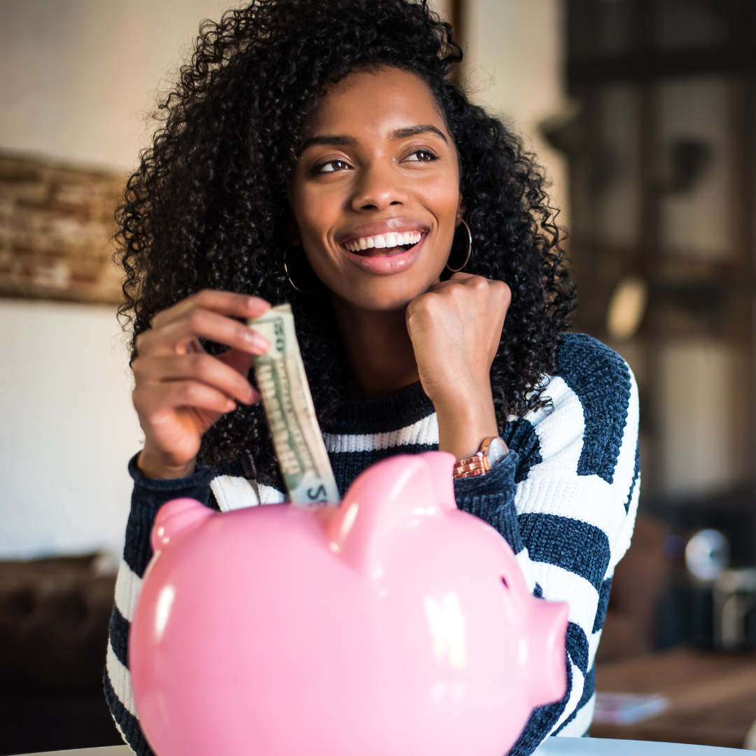 Black Woman Saving in Piggy Bank